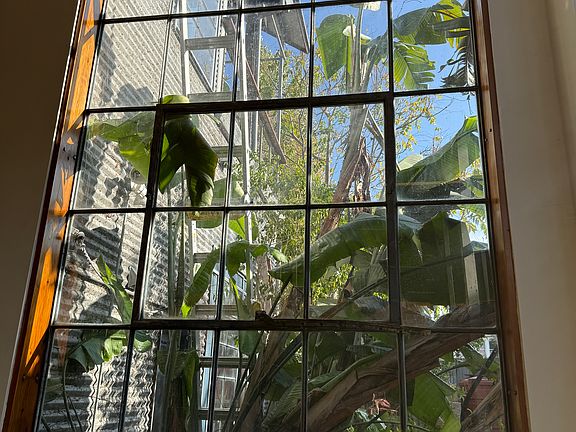 WINDOW TO RIGHT AS YOU COME IN THE FRONT ENTRY