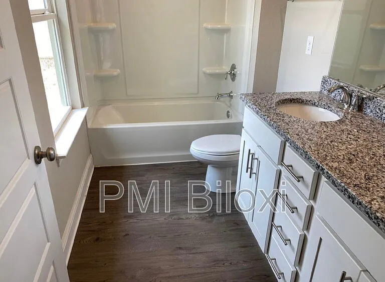 1208 Carraway Cv — Photo 13