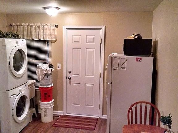 Stacked washer/dryer includ.