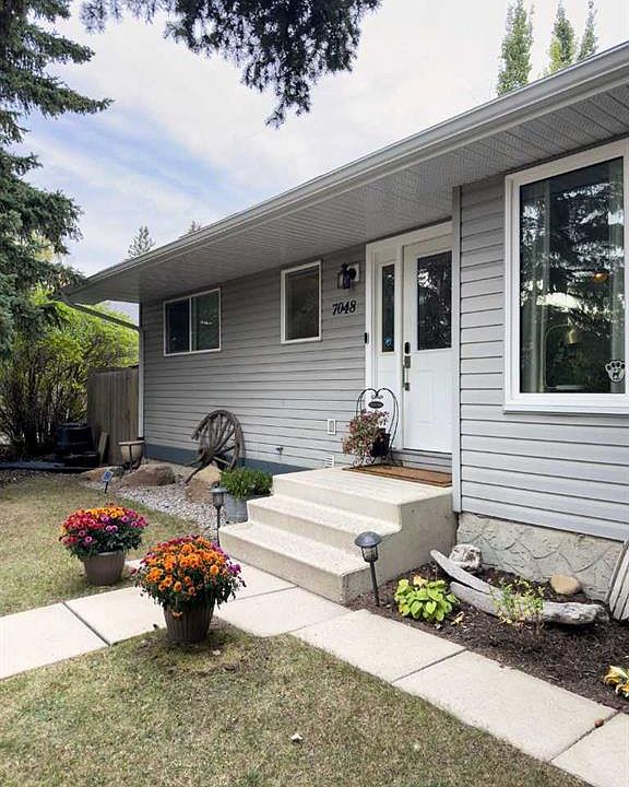 1st image of 7048 S 61st Ave NW