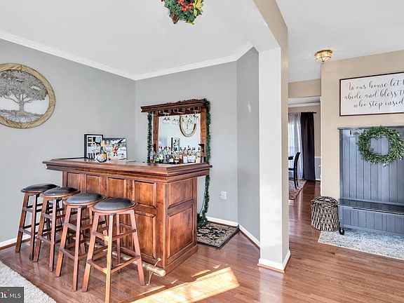 Welcoming entry. Hdwd floors carry thru main level