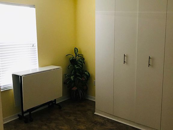 spare bedroom with queen size murphy bed
