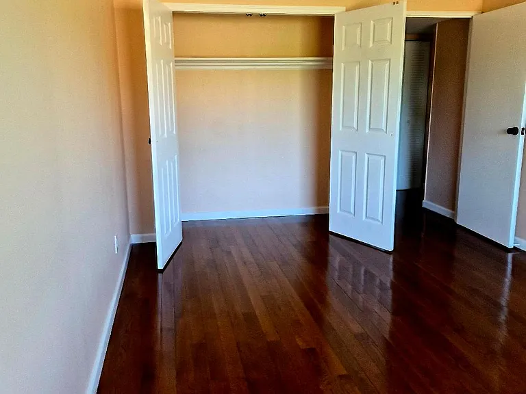 BEDROOM, LOTS OF CLOSET SPACE THROUGH OUT UNIT, NEW FLOOR
