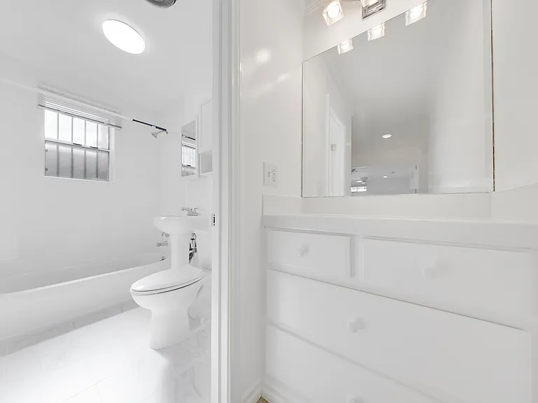 Dressing area next to bathroom