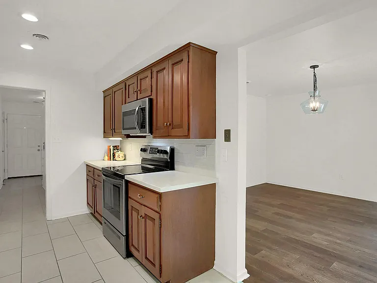 Updated Solid Surface Countertops and Backsplash