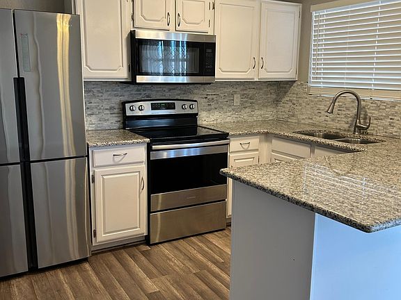 Kitchen with stainless steel appliances