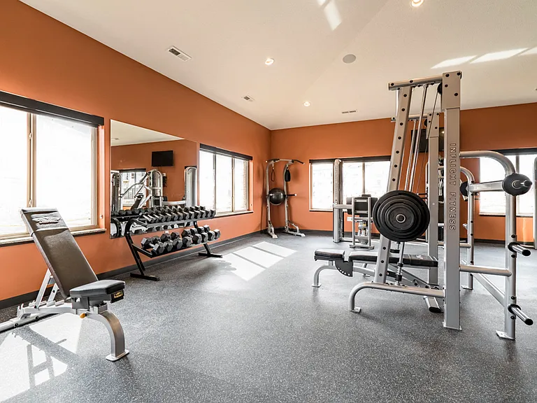Our 24-hour fitness center includes free weights, cardio equipment and weightlifting machines.
