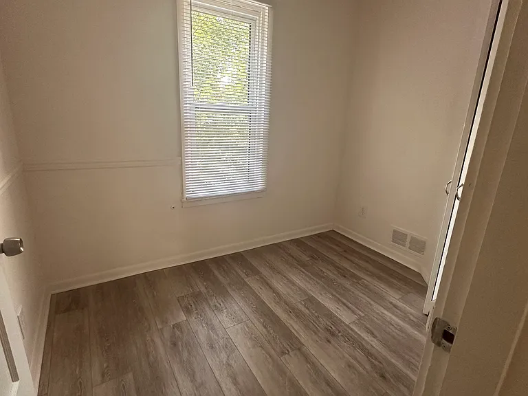 Den (0.5 bed). Tenant could utilize as office space or kids' room