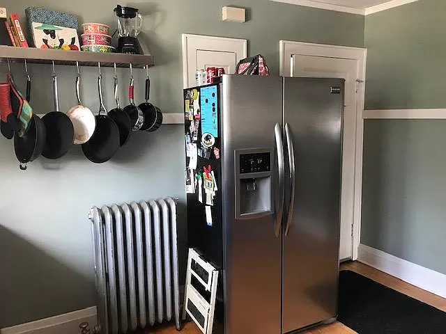 Kitchen continued - connected to back hallway and back entrance shared with upper unit