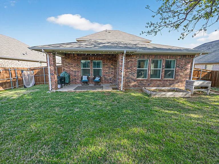 Backyard with covered patio