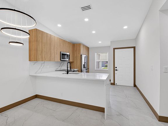 5th image of 8901 Windtree Street