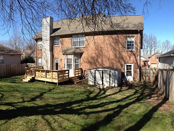 Fenced backyard with new ove