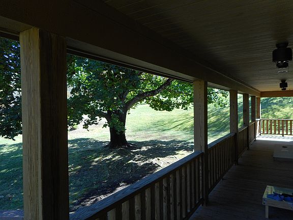 SIDE PORCH, CORN HOLE
