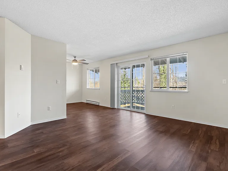 Experience the elegance of this open-concept living room, bathed in natural light. Experience the elegance of this open-concept living room, bathed in natural light.