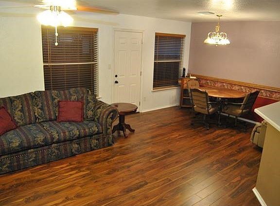 ~I'm the living room with new flooring, paint and great for entertaining~