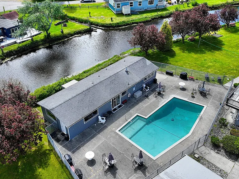 From L to R: Terrell Creek, the Cabana Clubhouse, and the pool.