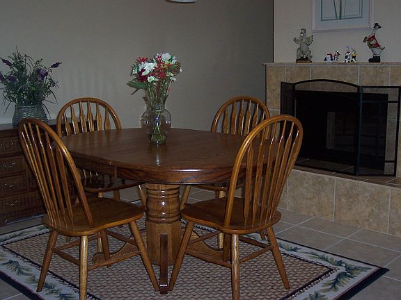 Formal Dining next to 2-sided fireplace