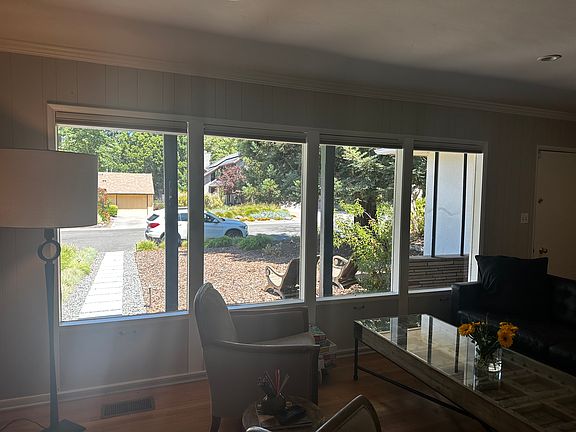 View from front of home, with Hunter Douglas motorized blinds for privacy