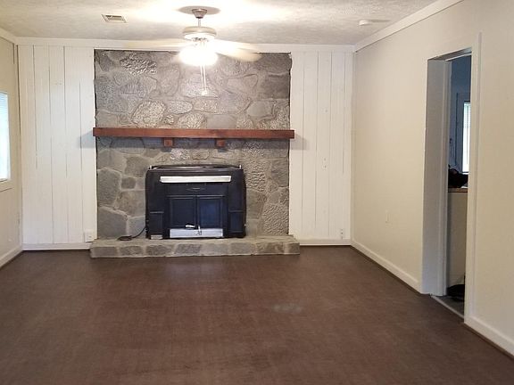 Living Room 27x13with inoperable fireplace /Central Air and