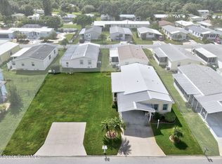 835 Sapodilla Dr, Barefoot Bay, FL 32976