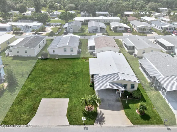 835 Sapodilla Dr, Barefoot Bay, FL 32976