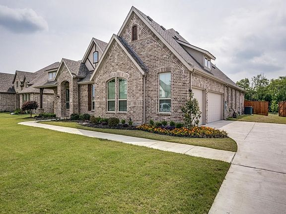 Loads of  extra parking on drive leading to 3 car garage.