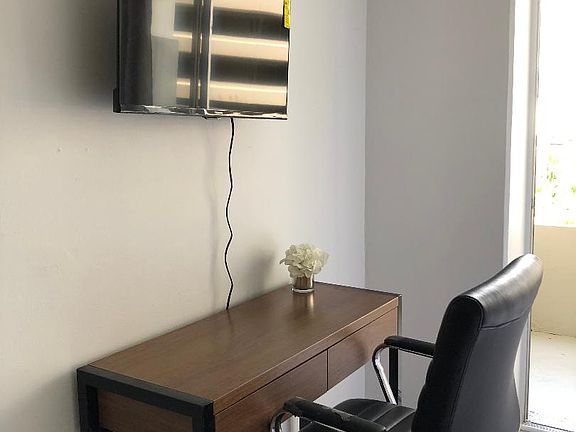 UNIT COMES WITH DESK AND CHAIR (DIFFERENT ONE, NOT IN PICTURE) AND FLAT SCREEN TV.