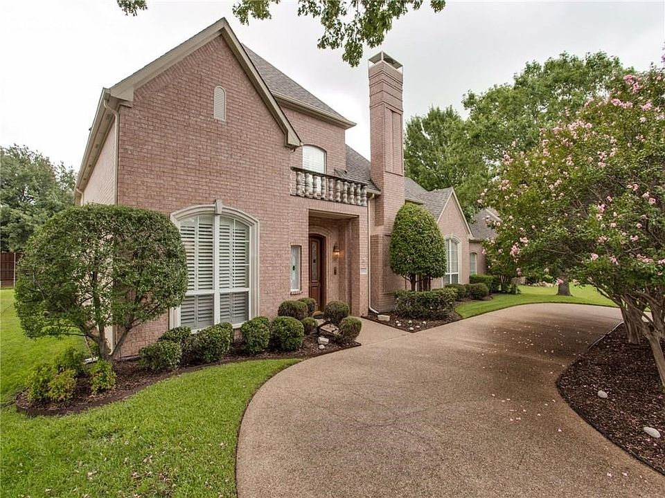 Welcome to 3113 Monette Lane! This lovingly maintained brick custom home has gorgeous curb appeal with cast-stone trim accents and luscious landscaping.