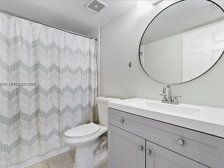 5065 Wiles Rd #308 — Photo 13