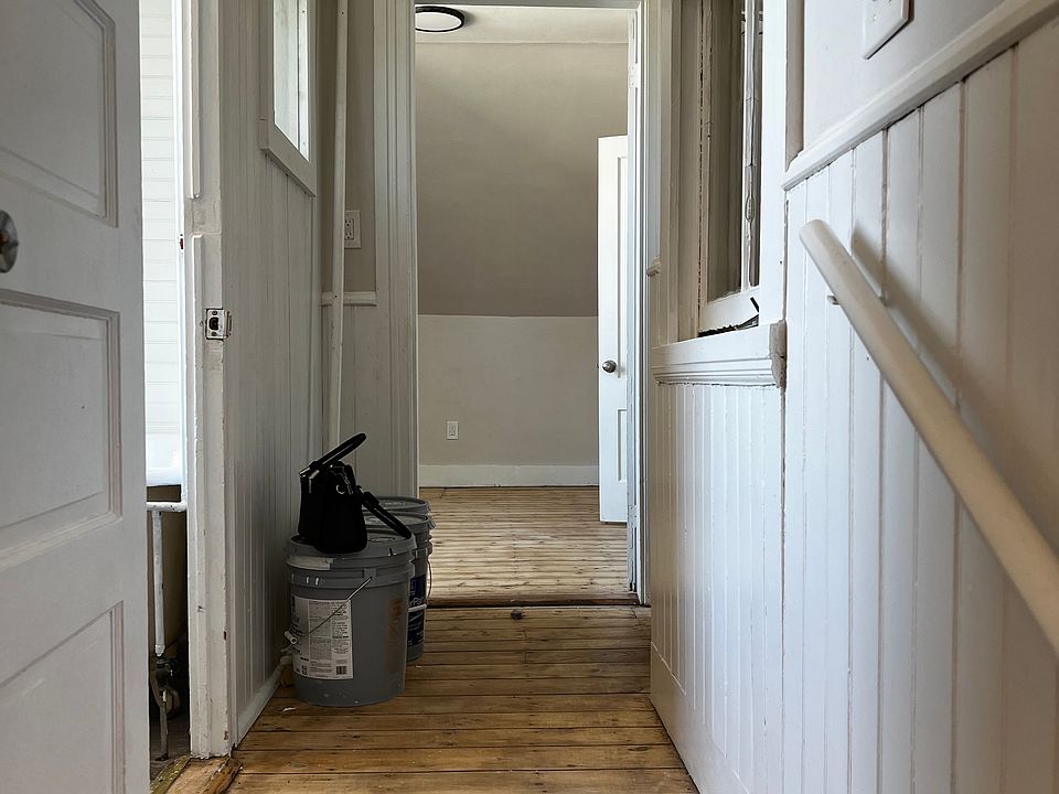 View from top of stair (bathroom door to the left)