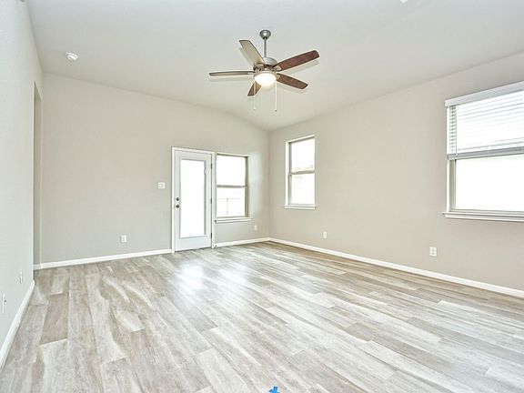 Living room in the San Saba floorplan at a Meritage Homes community.