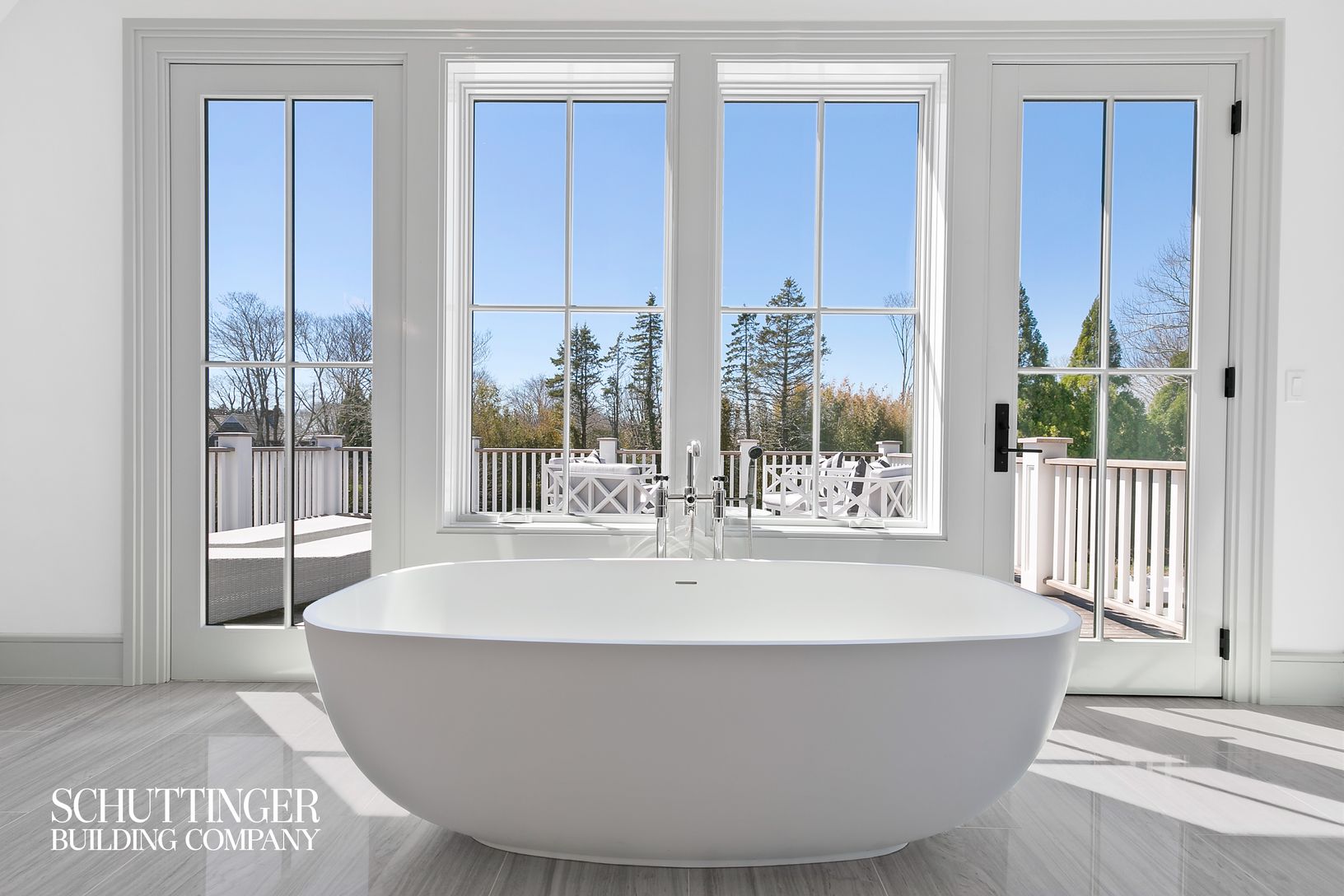  2nd Floor Master Bathroom Stone Resin Tub with Waterworks Tub Filler in Polished Nickel