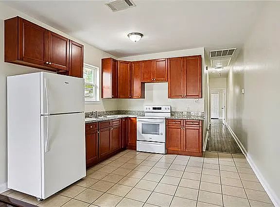 Kitchen with brand new appliances.