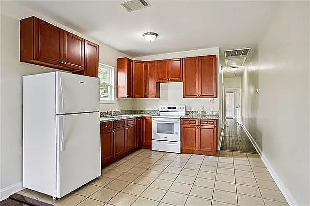 Kitchen with brand new appliances.