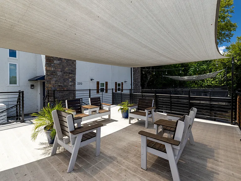 Enjoy this outdoor terrace with plenty of seating.