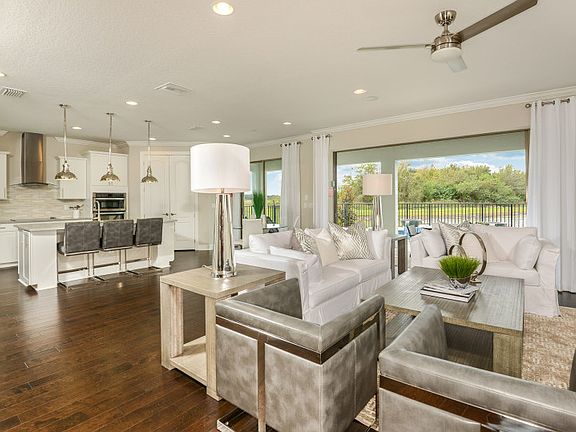 Open-Concept Gathering Room Designed with the Best Ideas from HomeownersRoom Adjacent to Kitchen