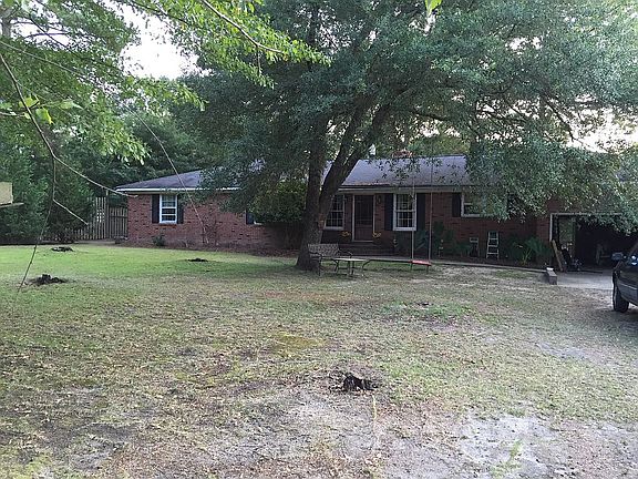 Old oak trees provide shade