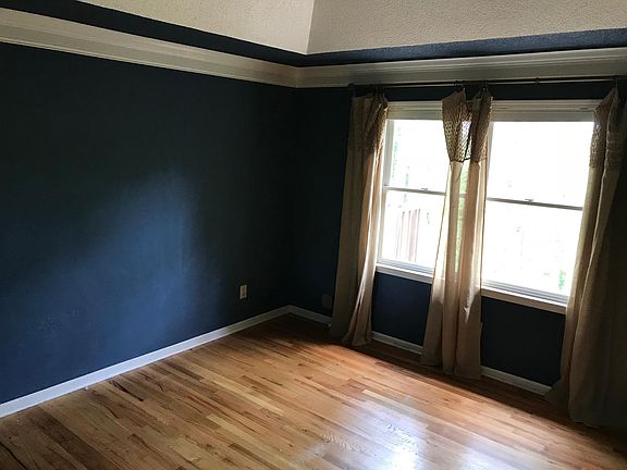 Master bedroom with tray ceiling