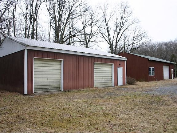 Two large out buildings with electric. One currently rented for extra income 