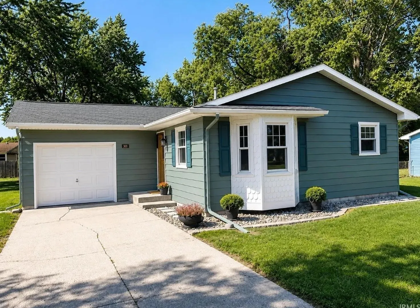 Check out this Charming 3-Bedroom, 1-Bathroom Home with Spacious Backyard — Photo 1