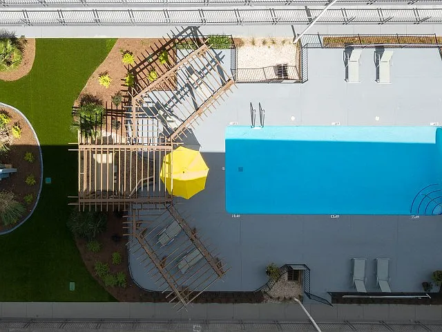 Relax in the Shade by the Pool with Sundeck Pergolas at Legacy Student Living