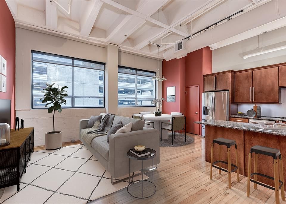 Fantastic 2/1 loft with TWO tandem assigned parking spaces in heart of Downtown! Tons of architectural charm including soaring exposed cement ceilings, industrial original windows and reclaimed wood floors! PHOTO VIRTUALLY STAGED.