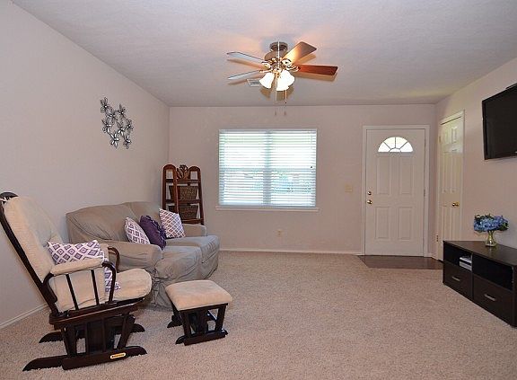 Tiled entry opens to living room