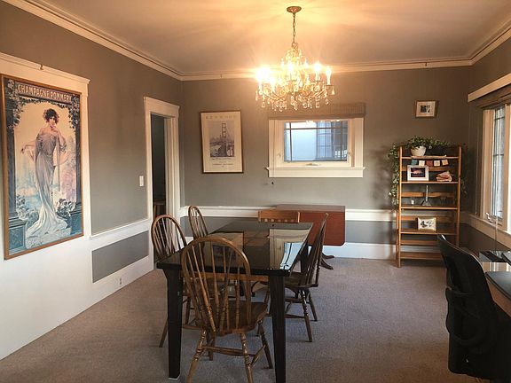 View from living room through arch into dining room