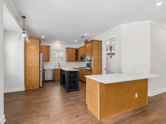 Kitchen View From Family Room with space for Bar Stools