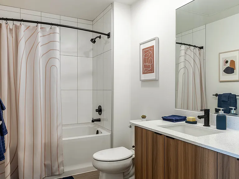 Elevated bathroom with warm finish package