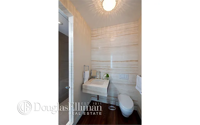 Sold by Douglas Elliman | media 12