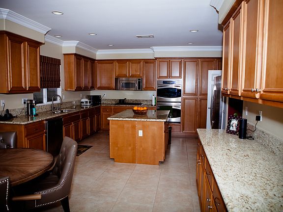 Kitchen has recessed lighting