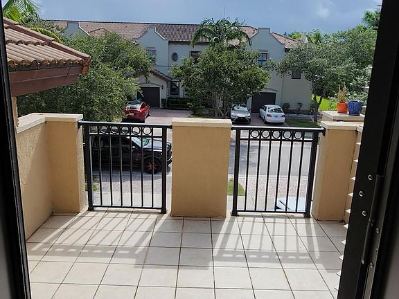 Upstairs Tiled Balcony with Outside French Swinging Door