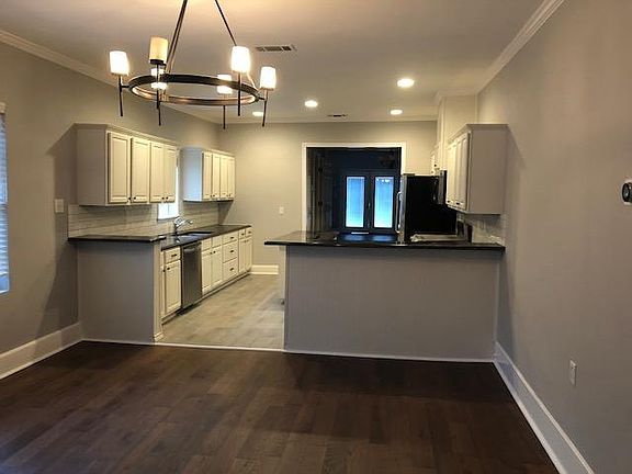 Dining room off the kitchen with open island.